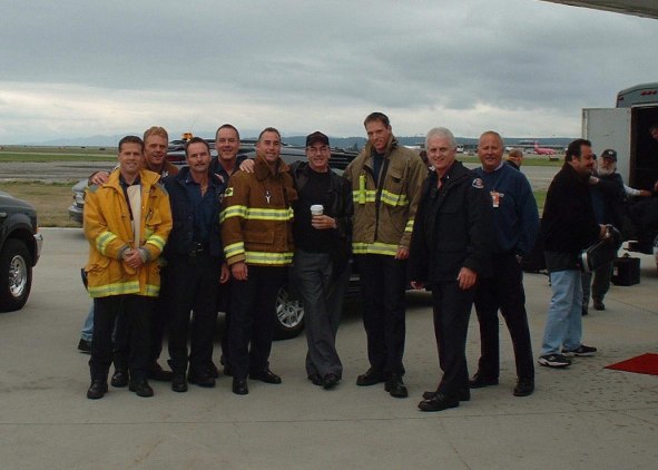 Neil Diamond and the Vancouver, BC Firefighters.  Photo by Stuart Corrigal, Fire Captain